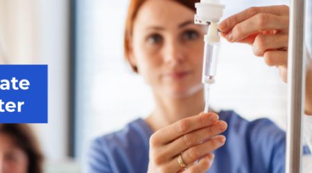 Nurse using a vial mate adapter